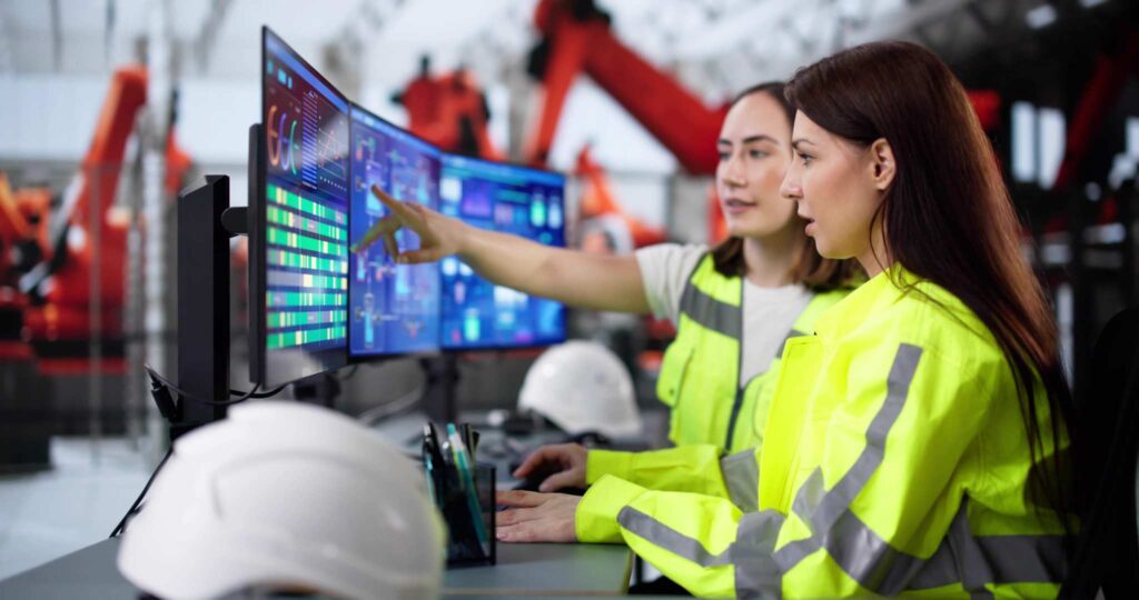 factory-operators-monitoring-robotic-production-dashboard