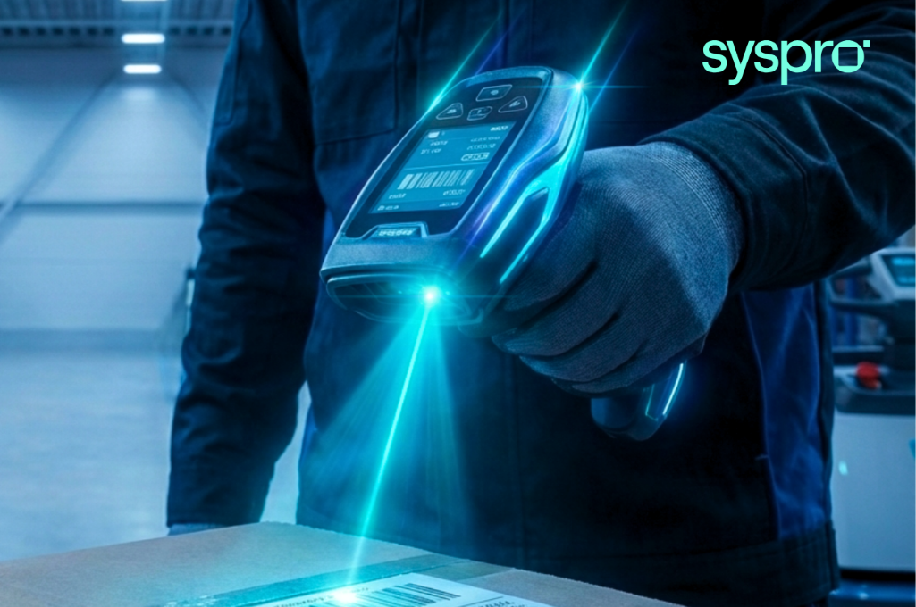 A warehouse worker in gloves using a handheld barcode scanner to track inventory in real time, representing Syspro Mobile Warehouse on the production floor.