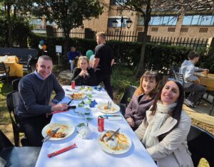 Syspro colleagues share lunch outdoors at the International Women in Engineering Day celebration.